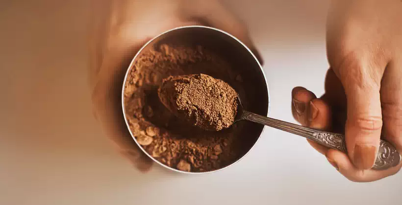Taking Cocoa Powder with a spoon